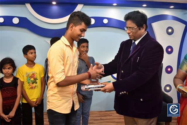 About Ten Poor and needy Students from Various Schools and Colleges of Mangalore brightened up as they received books, umbrellas and Education Scholarship from Grace Ministry on Sunday, June 16th, 2019. 